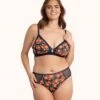The Busty Bralette: Poppy Floral -Wear Lively Shop 1 on model front busty bralette print poppy floral c55ab22e feac 459e ba59 7e1de3feedbe