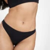 The No Show Thong: Jet Black 12 The No Show Thong: Jet Black -Wear Lively Shop 1 on model front no show thong jet black