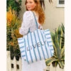 The Denim Stripe Tote - GWP: Denim Stripe -Wear Lively Shop 1 on model ugc front denim stripe tote denim stripe