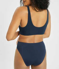 The All-You Swim Bralette: Navy -Wear Lively Shop 3 on model back all you swim bralette navy
