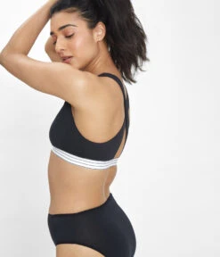 The Cross Back Bralette: Jet Black -Wear Lively Shop 3 on model front2 cross back bralette jet black