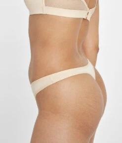 The All-Day Thong 5-Pack: Toasted Almond -Wear Lively Shop 3 on model side all day thong toasted almond