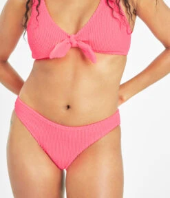 The Ruched Plunge Bralette & Bikini Swim Bundle: Electric Pink -Wear Lively Shop 6 on model front swim ruched bikini bottom electric pink